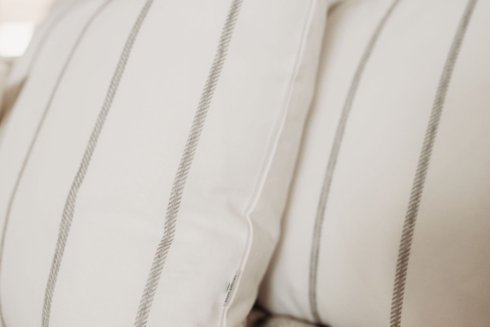 Close up of the striping on the Embroidered Stripe Accent Pillow