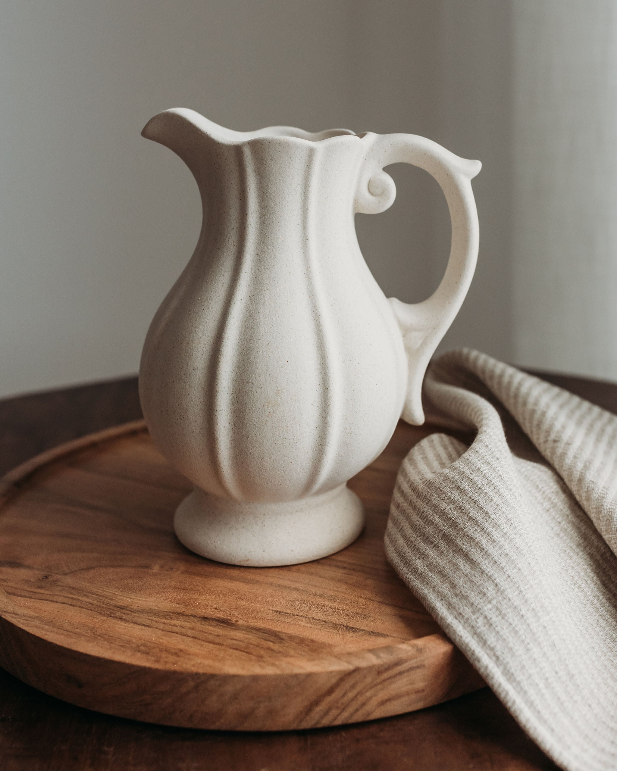 The French pitcher on an Acacia plate.