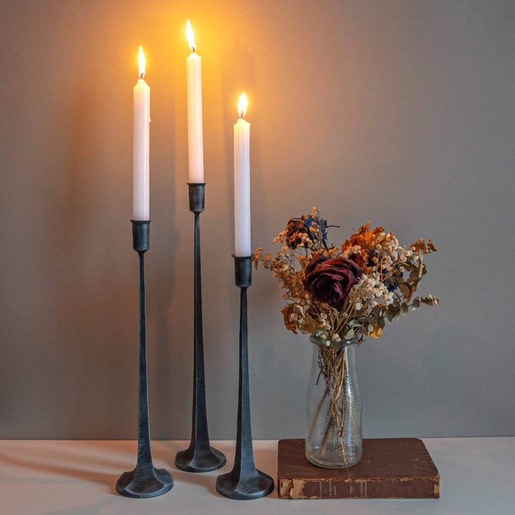 Modern Taper Candle Holders on a table.